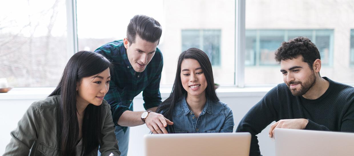 Business students working on a computer